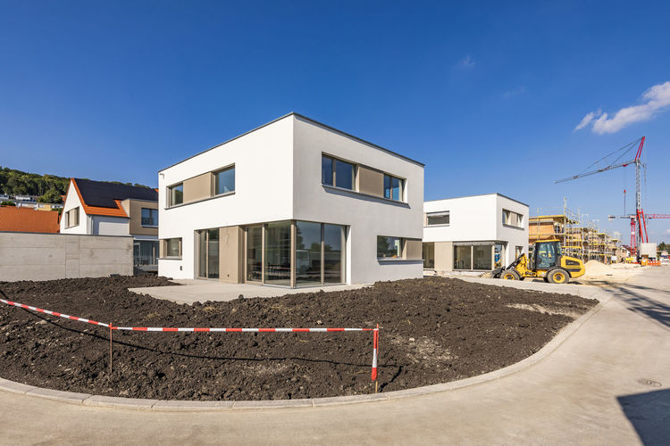 Germany, bavaria, elchingen, patch of dirt in front of modern suburban house