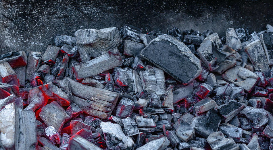 Black hot embers in the grill