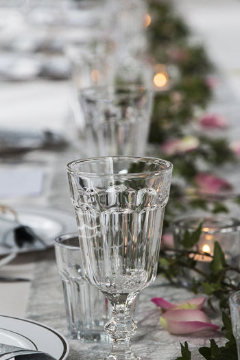 CLOSE-UP OF WATER IN GLASS ON TABLE