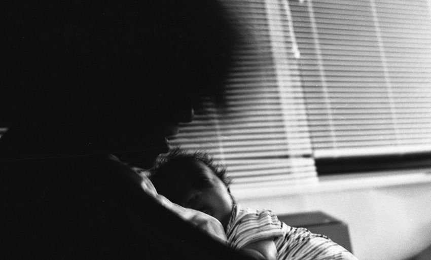 Close-up of boy sleeping at home