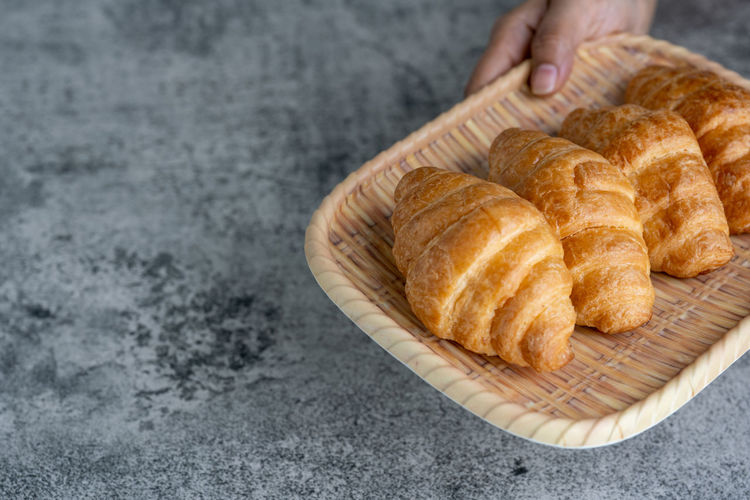 Close-up of hand holding bread