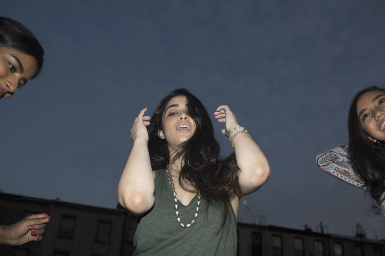Young women dancing at a party