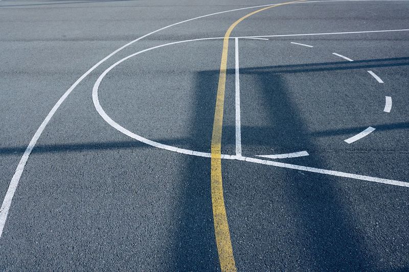 Shadows on the street basketball court