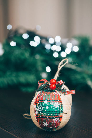 Close-up of illuminated christmas tree on table