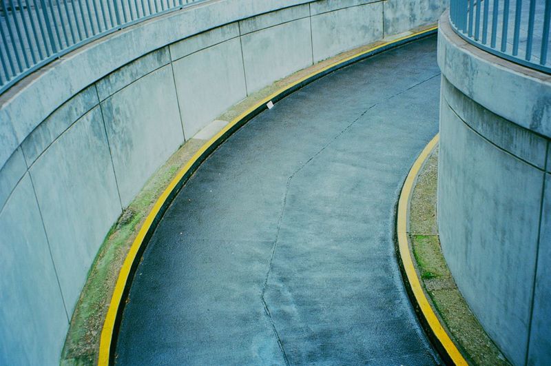 High angle view of bending city road
