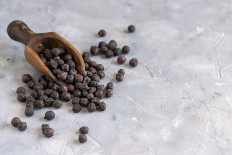 Dry black chickpea from apulia and basilicata in italy on the wooden scoop 