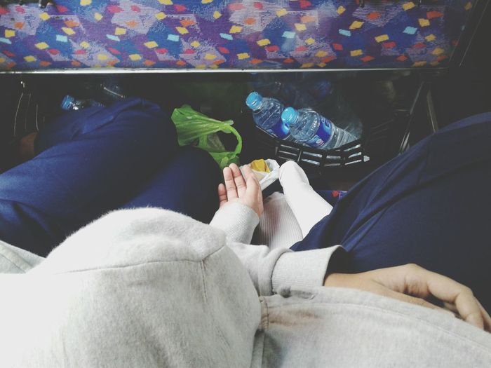 People sleeping while traveling in bus