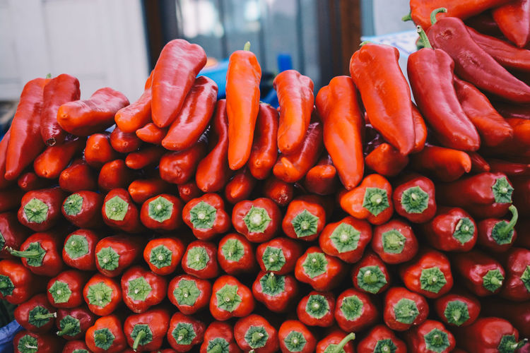 Close-up of red chili peppers for sale at market stall