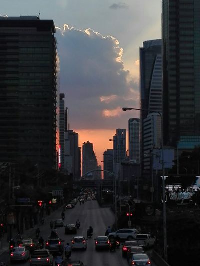 Traffic on city at sunset
