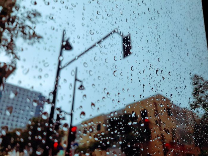 Close-up of raindrops on glass window