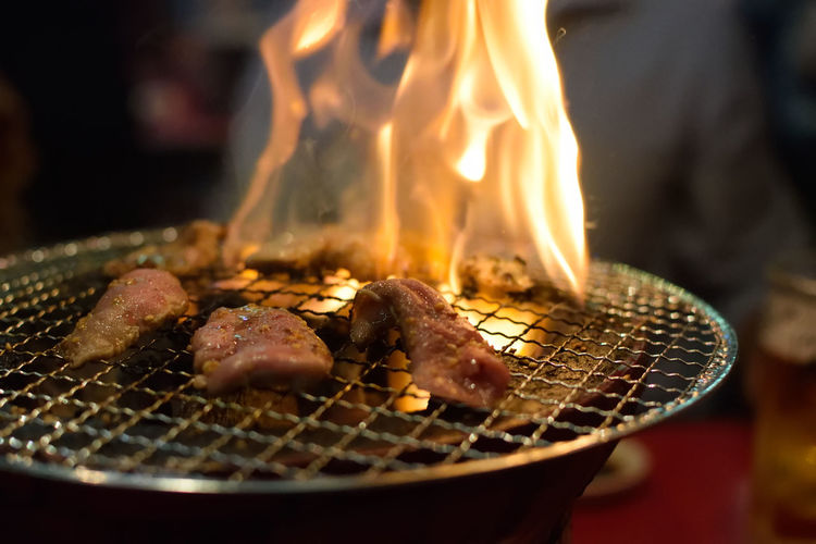 Close-up of meat on barbecue