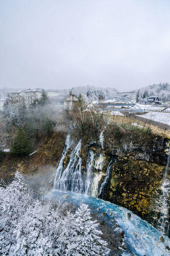 Shirogane hot spring village of biei city, stands this 30m tall white beard waterfall. 