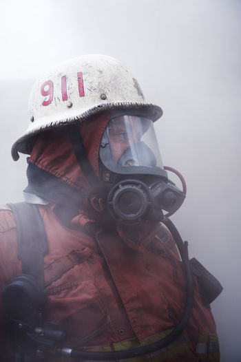 Fire fighter wearing oxygen mask