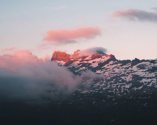 Scenic view of mountains against sky during winter
