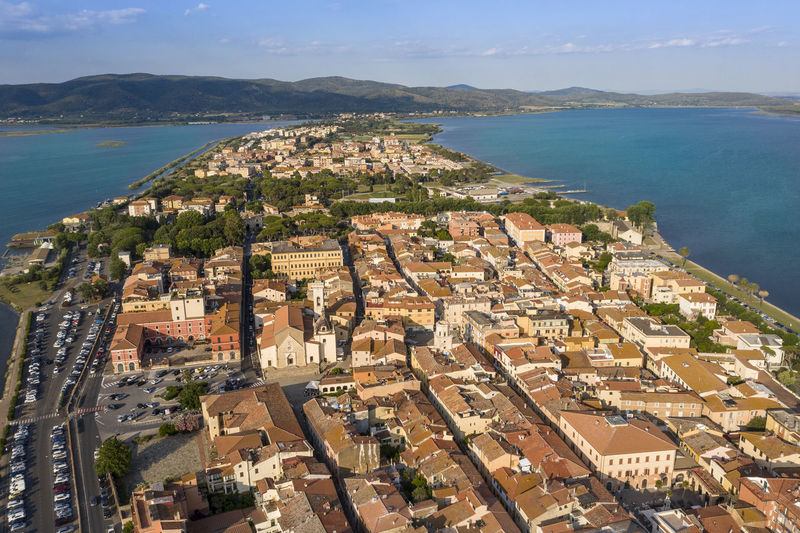 Aerial view of the seaside town of orbetello on the tuscan coast in the maremma eastern lagoon