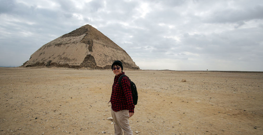 Asian tourist travel to egypt bent pyramid in saqqara architecture destination