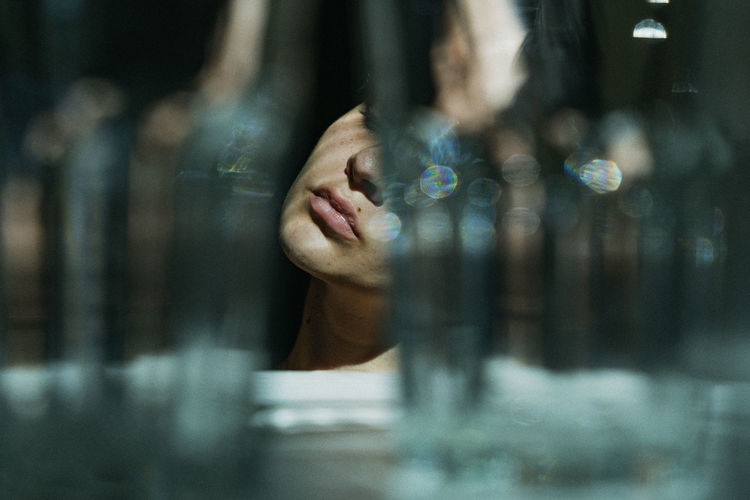 Woman lips, behind the glas