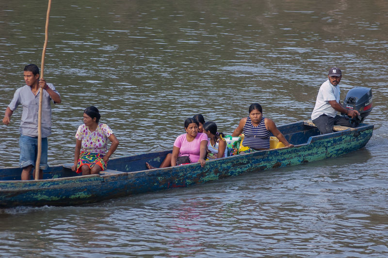 People on boat in water