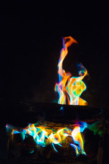 Close-up of bonfire against black background