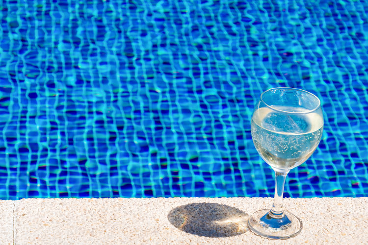 High angle view of drink in swimming pool