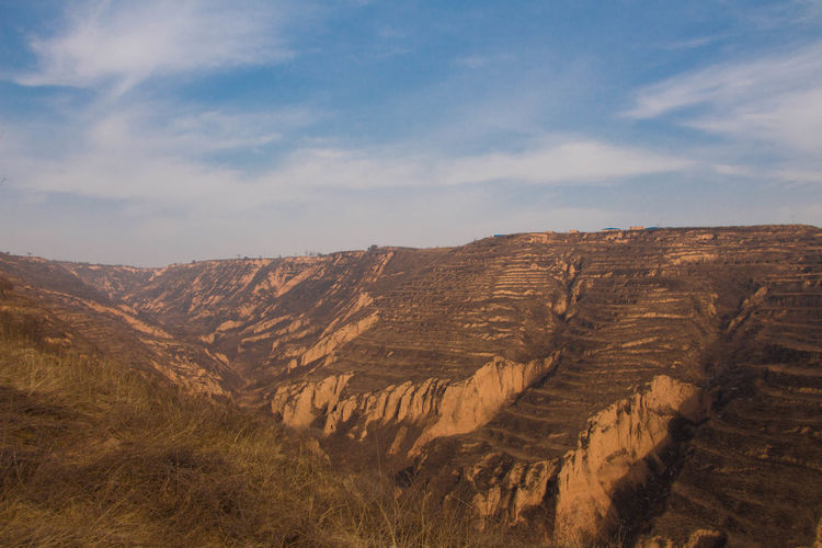 Scenic view of loess plateau against sky