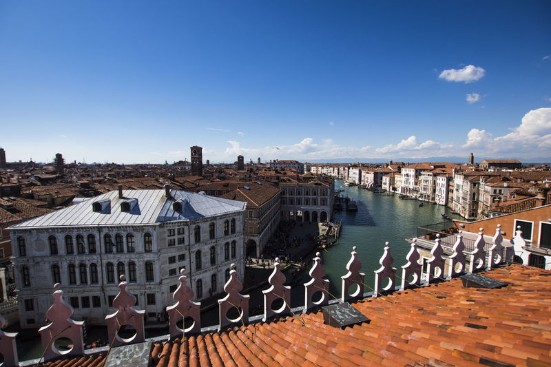 High angle view of grand canal amidst buildings against sky