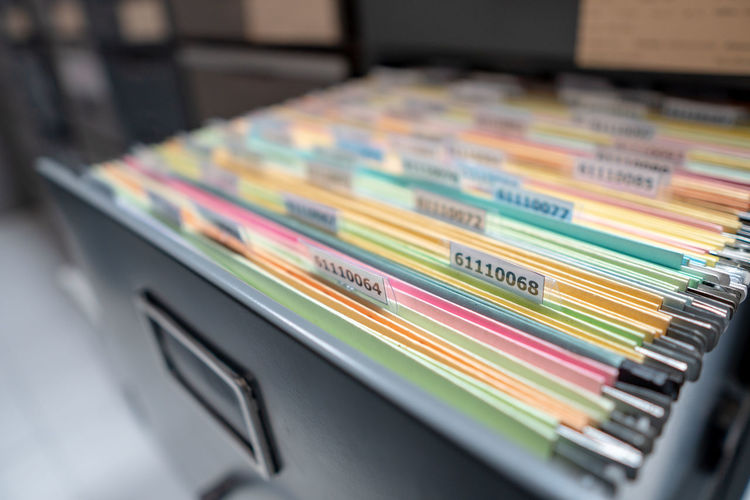 Close-up of files in drawer at office