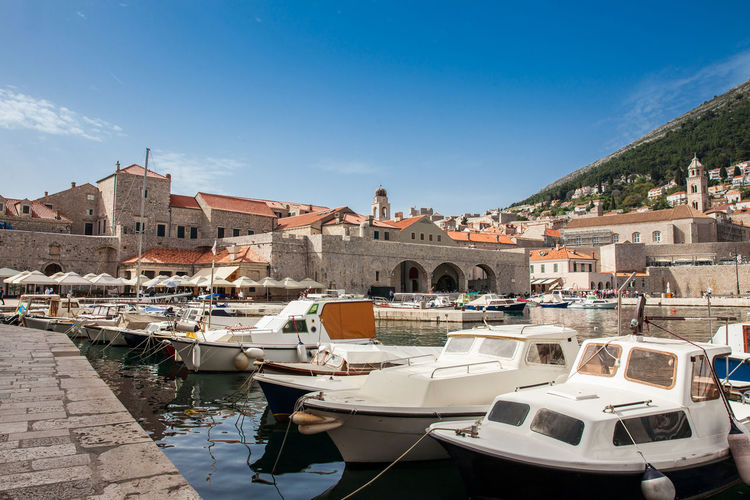 Dubrovnik city old port marina and fortifications