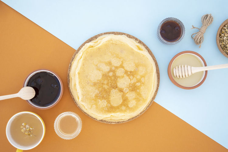 Shrovetide maslenitsa butter week festival meal. russian pancakes with butter, honey and jam. 