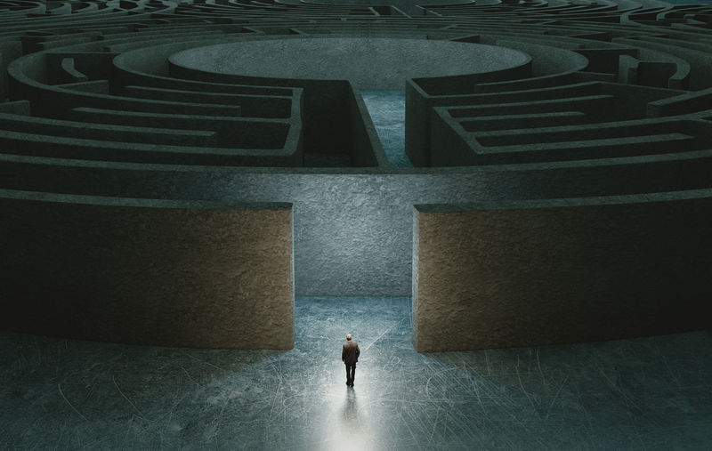 High angle view of man walking in maze