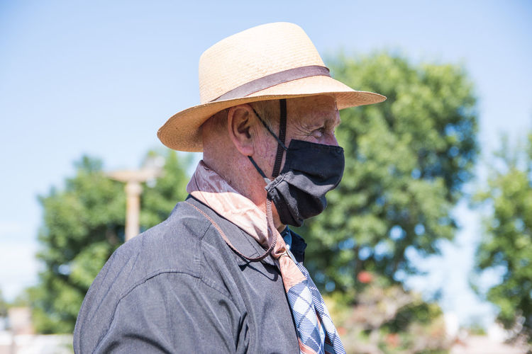Senior adult man wearing face mask