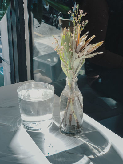 Close-up of glass vase on table
