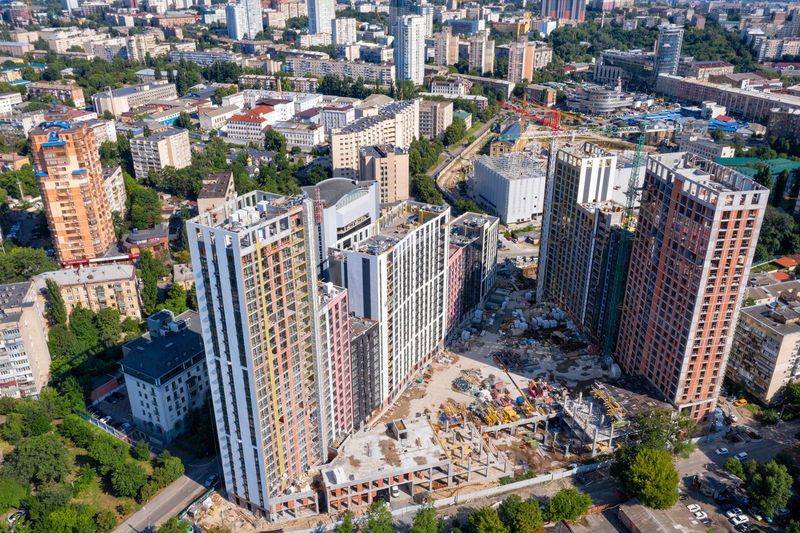 Aerial photography of residential areas of the city with view of new skyscrapers under construction