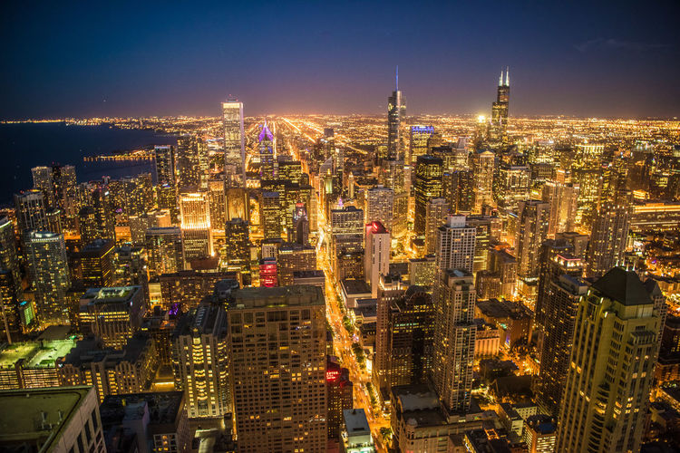 Illuminated cityscape at night