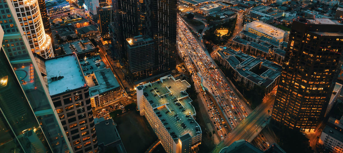 Aerial view of city buildings at night
