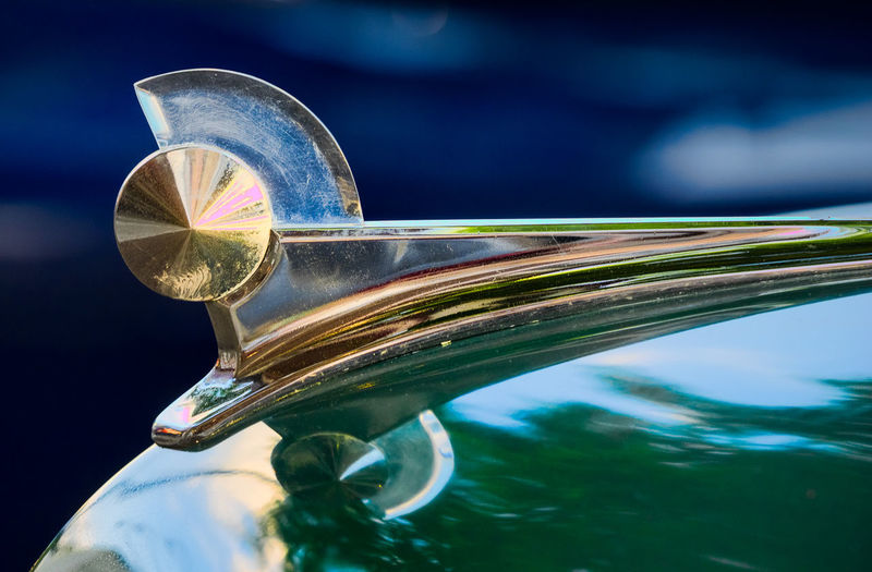 Close-up of metal on vintage car hood