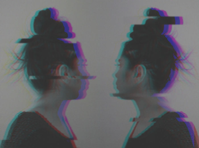 PORTRAIT OF WOMAN LOOKING AWAY