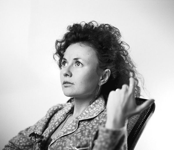Portrait of woman sitting in chair
