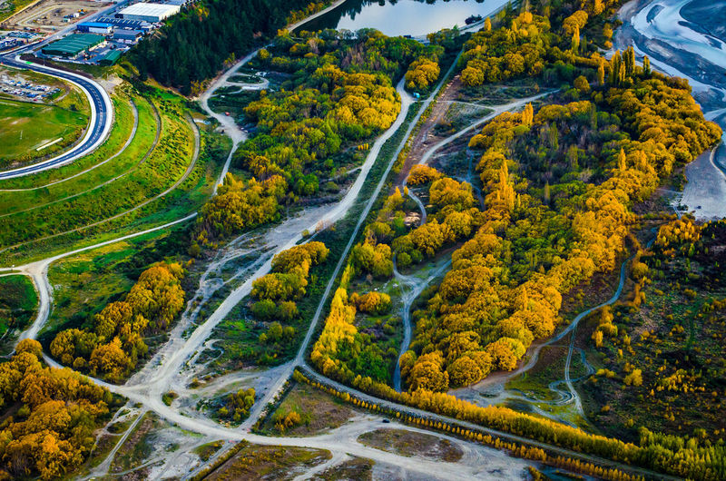 High angle view of road amidst trees in forest