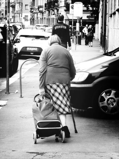 Woman sitting on street