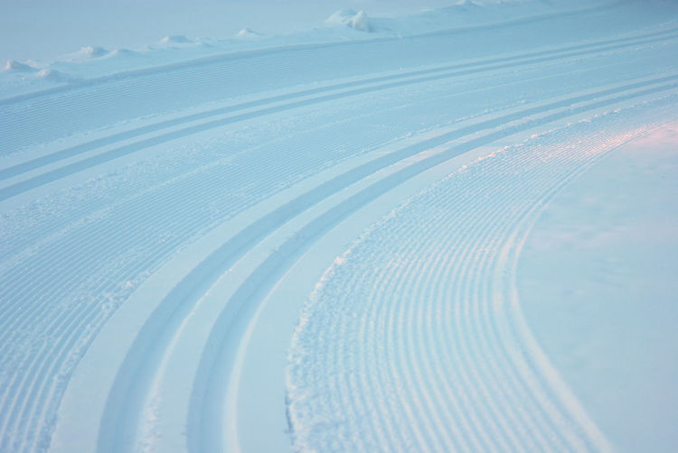 A curve on an empty classic cross-country ski trail. fresh velvet