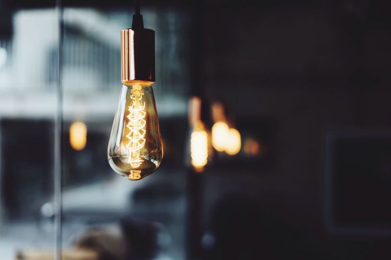 Close-up of glowing electric bulb