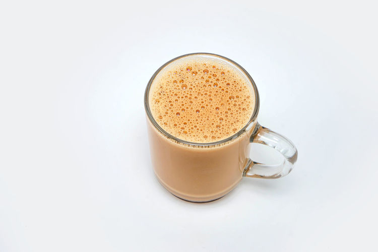 High angle view of coffee against white background