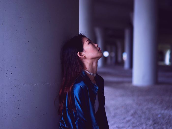 Close-up of young woman with eyes closed
