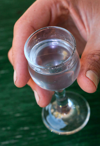 Close-up of man holding drink