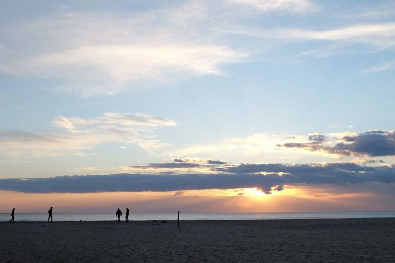 Scenic view of sea at sunset