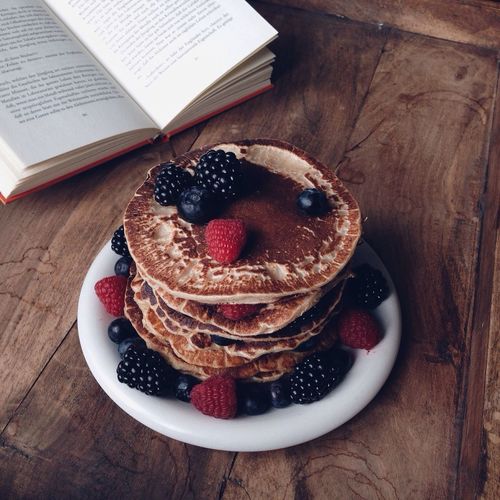 High angle view of pancakes in plate on table