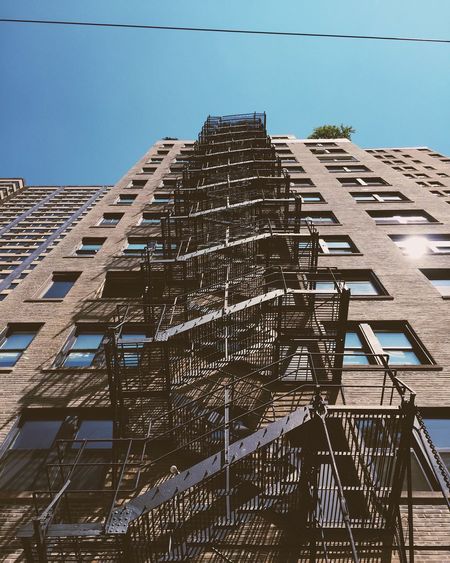 Low angle view of fire escape on building