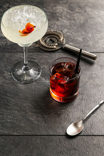 High angle view of drinks on slate
