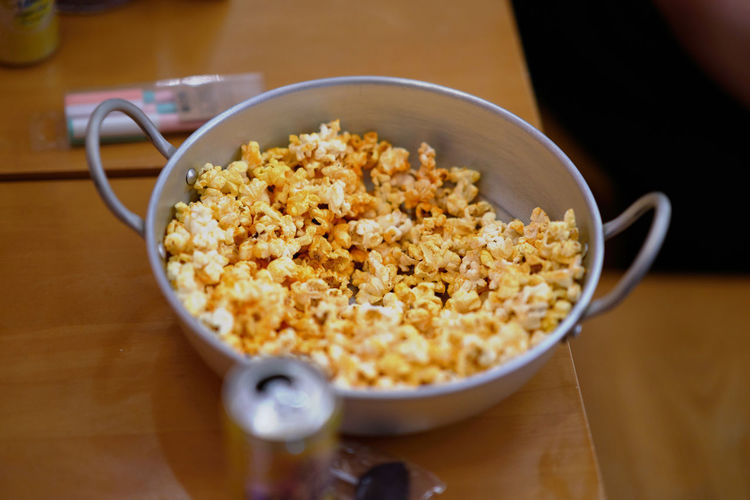 High angle view of popcorn served on table